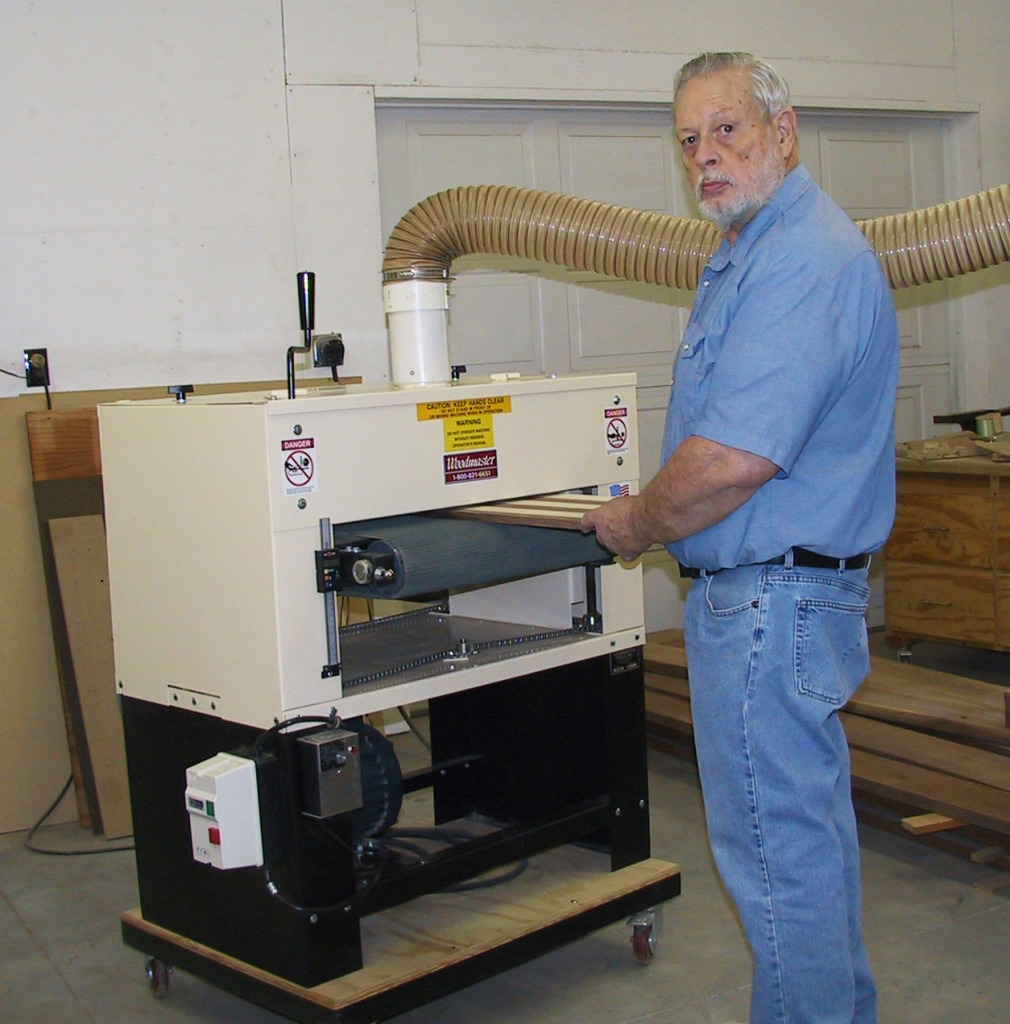 Here's Dennis in his show with his 2675 Woodmaster Drum Sander. That's where you'll often find him — some of his creations take 200 hours of shop time. Design time not included!