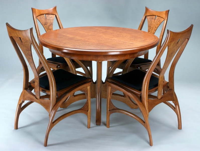 “While at the Marc Adams School of Woodworking, I was admitted into the Michael Fortune Fellowship Program. I made this one-of-a-kind table and chairs from bent laminations of quarter-sawn cherry. Following the bending process, all surfaces were sculpted to the shape you see in the photo.”