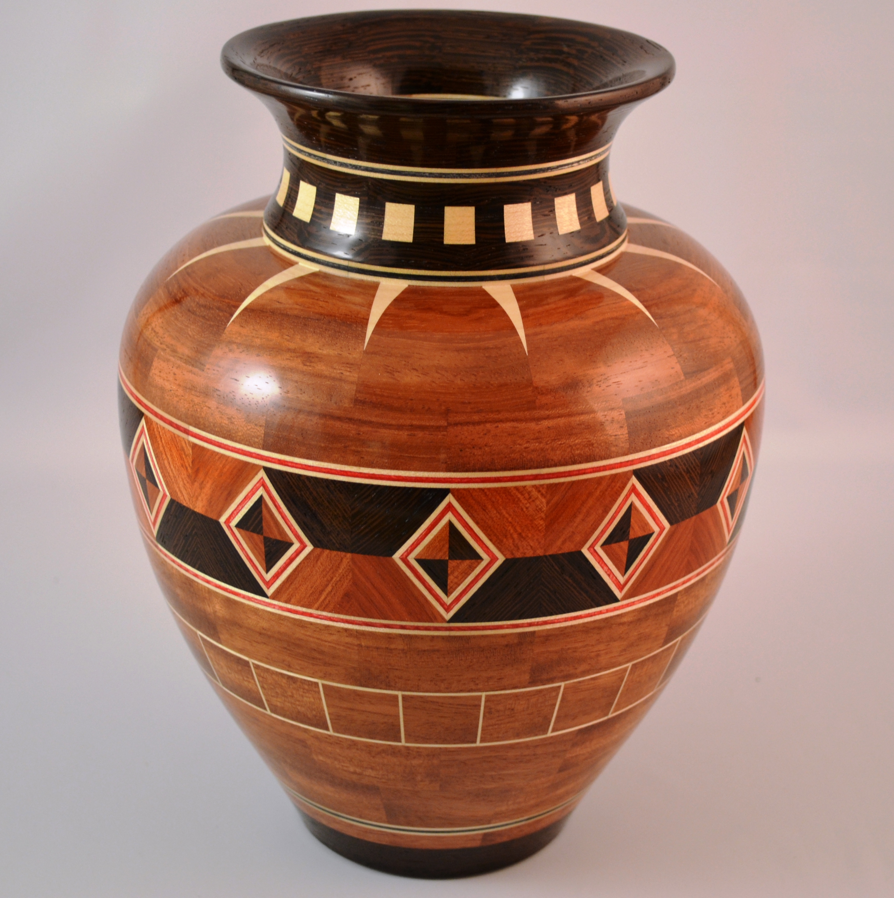 Vase with Diamonds – 8-1/4” diameter X 9-1/2” tall – woods used: Bubinga, Wenge, Maple and dyed veneers – 571 pieces of wood