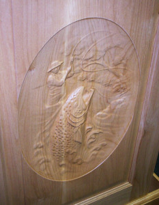 Rick built this cabinet door then did some mighty fancy bas relief carving work with his CNC routing machine. 