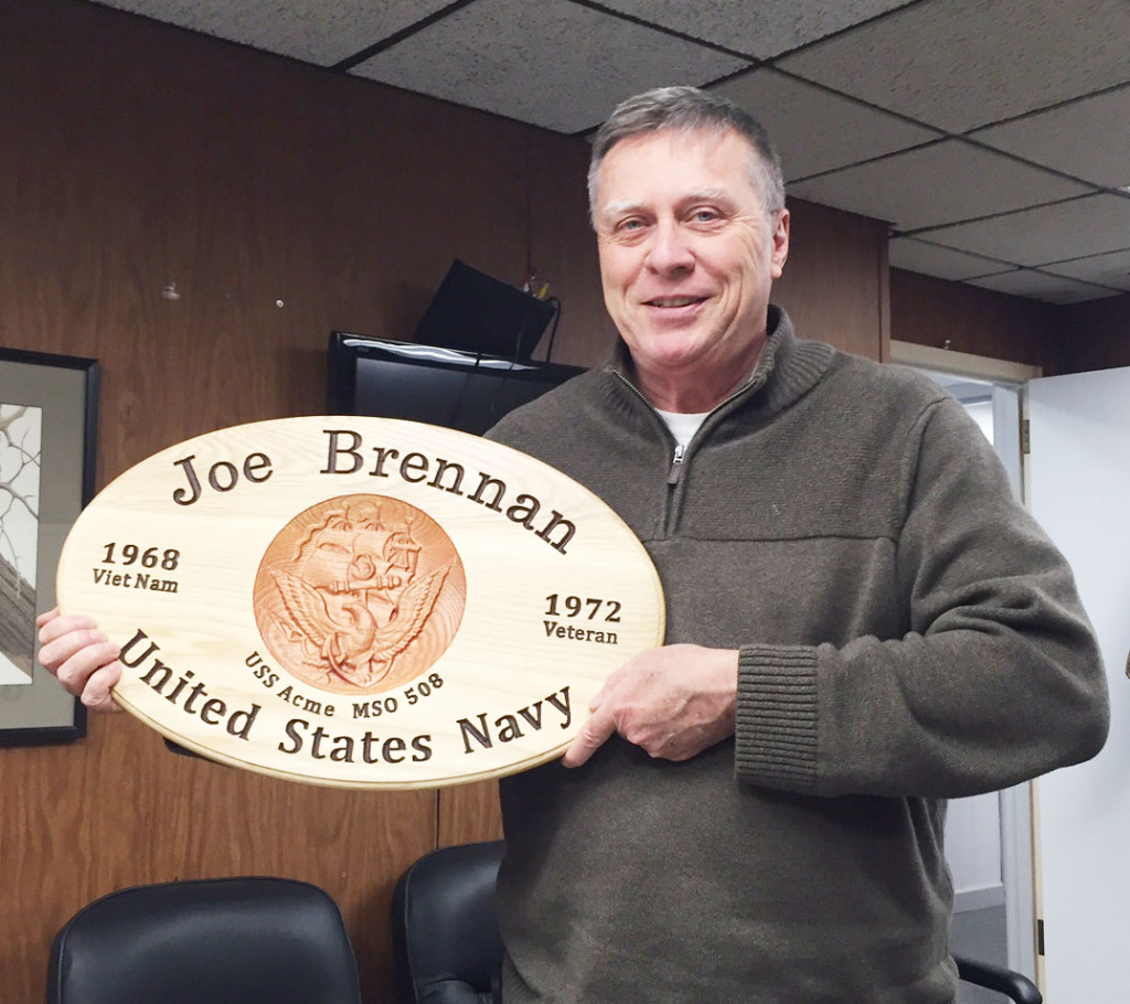 Here's our man Joe Brennan, head of sales at Woodmaster. Joe was surprised and very pleased when he received the service plaque Dennis made for him.