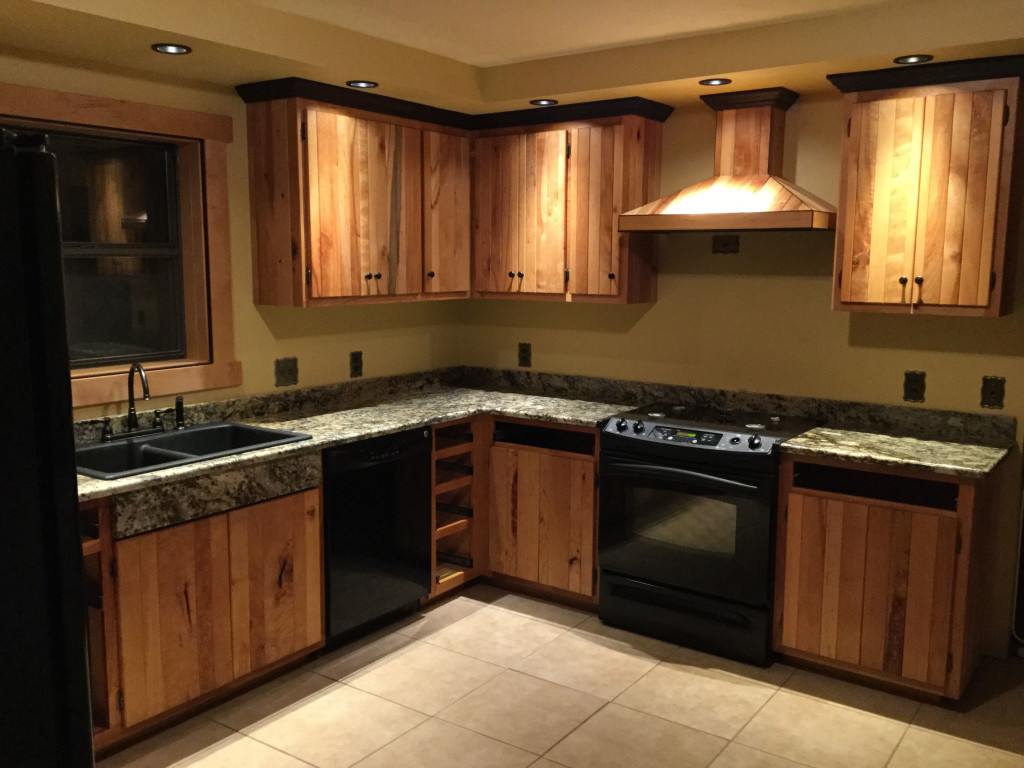 Harmon Heirloom Furniture recently completed this handsome kitchen complete with tongue & groove Red River Birch, Wenge Trim, and granite counters.